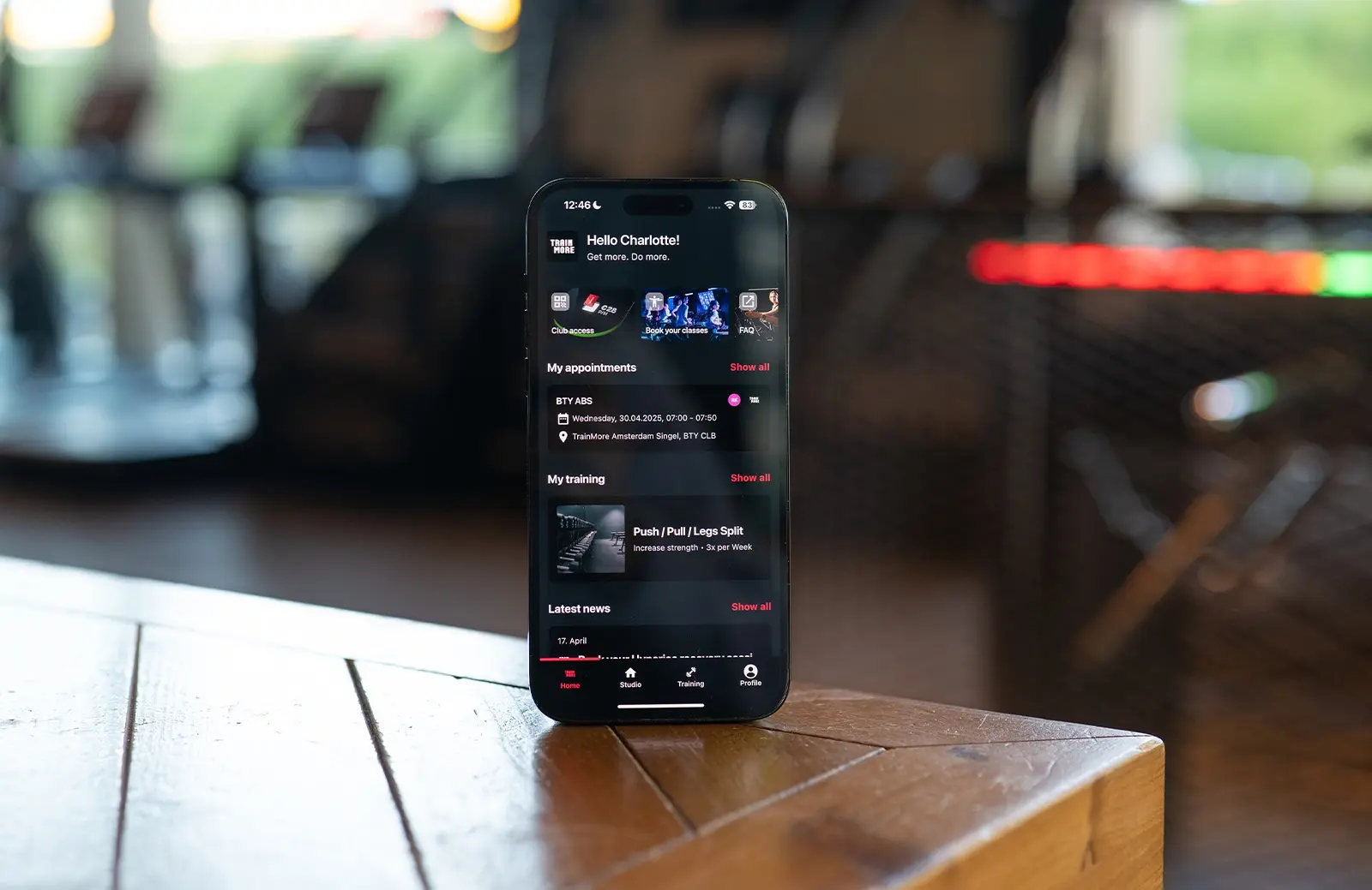 Mockup van de TrainMore app